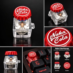 Peut inclure: Une touche de clavier mécanique avec un design de capsule de bouteille rouge portant le texte blanc Nuka Cola. La touche possède une base en plastique transparent révélant le mécanisme interne et est présentée sous plusieurs angles.