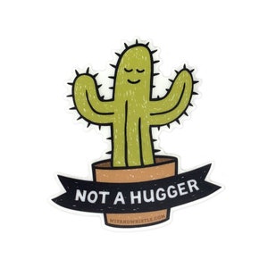 May include: A sticker featuring a cartoon cactus in a brown pot. The cactus is green with black spines and a smiling face. A black banner below reads "NOT A HUGGER" with "WITANDWHISTLE.COM" below it.