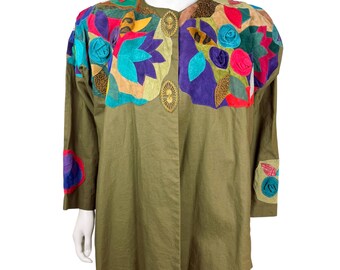 Jaqueta vintage dos anos 80, estilo oversized, em linho, algodão e camurça com apliques, da Alexis Kreighoff Canada.