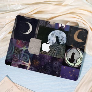 May include: A laptop skin featuring a collage of celestial and gothic imagery. The design includes moons, stars, a black cat, and a full moon. The color palette is dominated by deep blues, purples, and touches of gold, creating a mystical aesthetic.