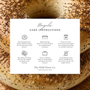 May include: A stack of three poppy seed bagels behind a white rectangular card titled Bagels CARE INSTRUCTIONS. The card features six icons and text detailing storage, freezing, slicing, and toasting tips from The Wild Flour Co.