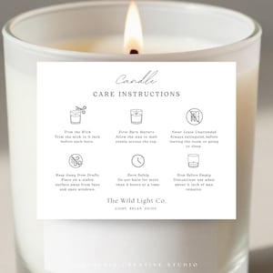 May include: A white frosted glass candle with a lit wick and a square instructional card featuring black text and icons. The card includes the title Candle CARE INSTRUCTIONS and details on trimming the wick to 1/4 inch, burning safely, and safety warnings.