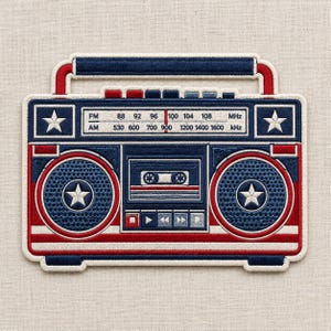 May include: Embroidered patch of a retro boombox in red, white, and blue. The design includes stars, a cassette tape, and radio frequency details. The patch has a white border and a handle.