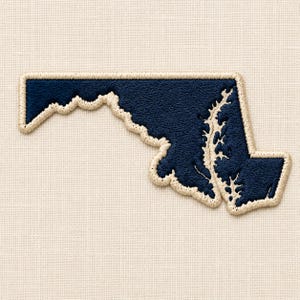 May include: An embroidered patch in the shape of the state of Maryland. The patch features a dark navy blue interior with a thick, cream-colored stitched border that outlines the geographic contours and the Chesapeake Bay water inlets.
