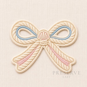 May include: An embroidered patch shaped like a bow made of cream-coloured rope texture. The bow features light blue accents within the loops and soft pink details on the tails, with a small pink seashell emblem centred at the knot of the bow.