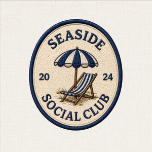 May include: An oval embroidered patch featuring a cream background with a dark blue border. The design depicts a blue and white striped beach umbrella over a matching striped lounge chair, with the text SEASIDE SOCIAL CLUB and the year 2024.