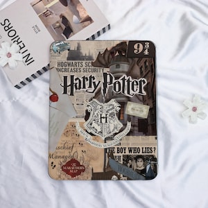 May include: A rectangular Harry Potter-themed tablet case featuring a collage of newspaper clippings, the Hogwarts crest, and the words "Harry Potter." The design includes the number "9 3/4" and images of the Marauder's Map and Hogwarts.