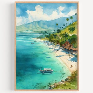 May include: Watercolour painting of a tropical beach scene. Turquoise water meets a sandy shore lined with palm trees and a small building. Mountains and a blue sky with clouds complete the landscape. The artwork is framed in a light wood.
