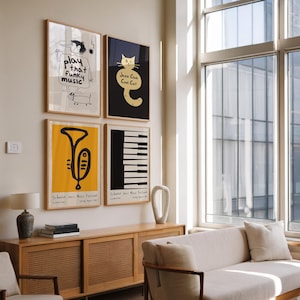 May include: A living room interior with a white couch, a wooden cabinet with woven cane doors, and a wall with four framed posters. The posters feature a black and white illustration of a trumpet, a black and white illustration of a piano keyboard, a black and white illustration of a cat with the text "Jazz Club Cool Cat", and a black and white illustration of a person with the text "Play that funky music".
