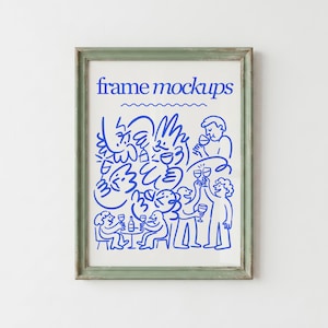 May include: A framed print featuring a blue line art illustration on a white background. The text "frame mockups" is printed at the top in blue. The illustration depicts several figures holding wine glasses in a social setting.