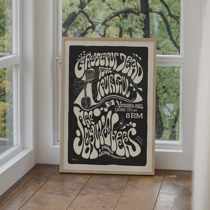 May include: Black and white poster with psychedelic font advertising a concert by The Grateful Dead and The  Joyful Noise. The concert is at Veteran's Hall on June 17th, 1968 at 8 PM. The poster is a Thunder Machine Production.