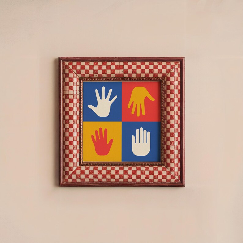 May include: A framed print with a red, white, and blue checkered border. The print features four colorful handprints in a grid pattern.