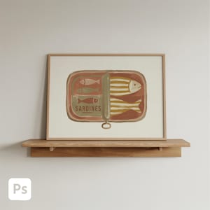 May include: A framed art print featuring a stylized illustration of sardines in a can. The artwork showcases a rectangular can with the word "SARDINES" and several fish in shades of brown, beige, and yellow. The print is displayed on a wooden shelf.