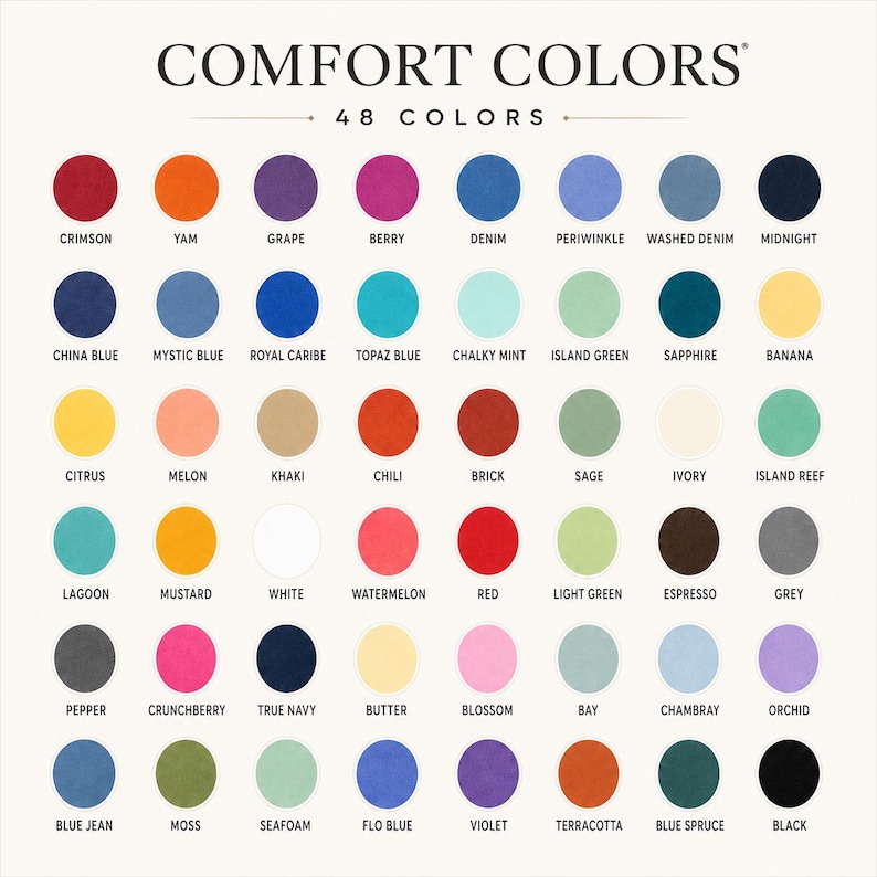 May include: A Comfort Colors color chart featuring 48 circular swatches arranged in a grid. Each circle displays a unique color with its corresponding name printed underneath, including shades like Crimson, Yam, Grape, Berry, Denim, and Midnight.
