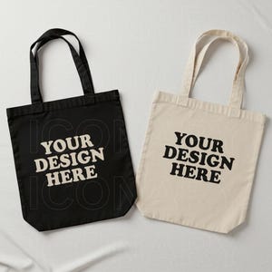 May include: Two tote bags, one black and one beige, with the text "YOUR DESIGN HERE" printed in a retro font.