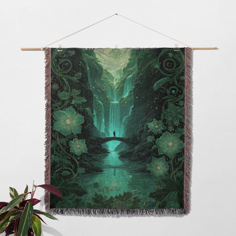 May include: A woven tapestry featuring a serene landscape with a waterfall, bridge, and figure. The artwork is dominated by shades of green and teal, with floral and foliage details. The tapestry is hung on a wooden rod.