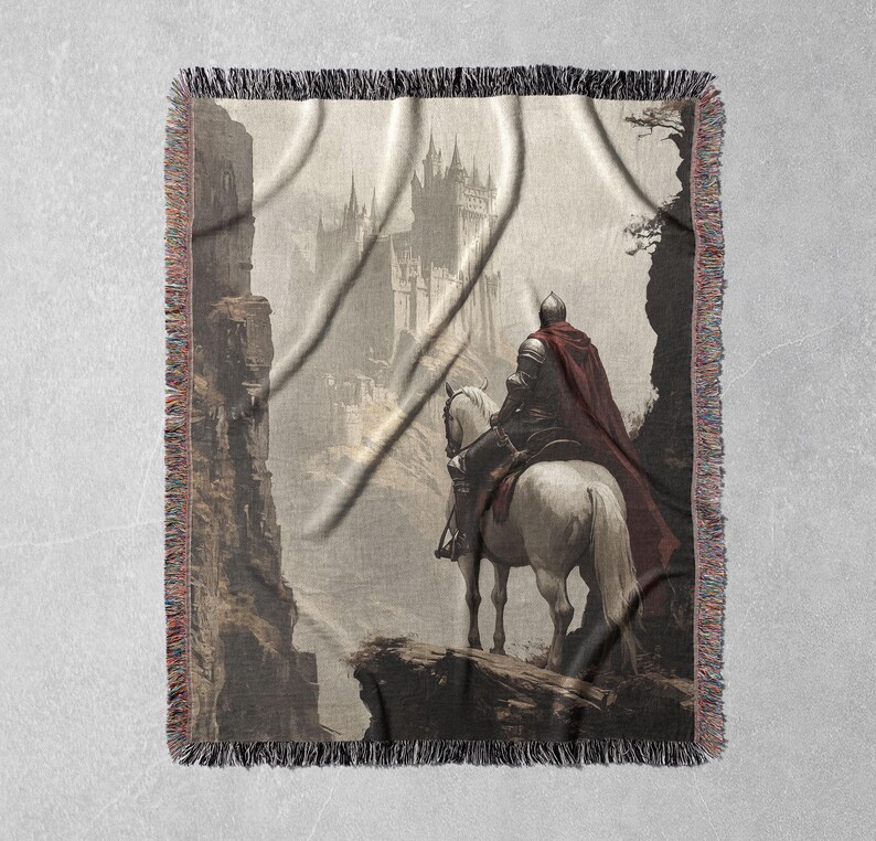 May include: A tapestry featuring a knight on horseback riding towards a large, imposing castle in the distance. The knight is wearing a red cloak and a helmet, and the horse is white. The background is a misty, gray landscape.