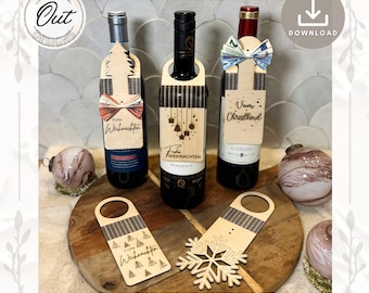 May include: Three wooden wine bottle tags with different Christmas designs. The tags are engraved with the words "Frohe Weihnachten" and "Vom Christkind". The tags are on a wooden surface with a snowflake and a bottle of wine.