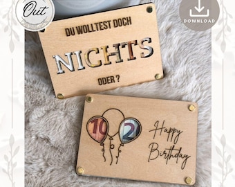 May include: Two wooden signs with cut-out designs. The first sign says "Du wolltest doch nichts oder?" The second sign has two balloons with the numbers 10 and 2 inside and says "Happy Birthday".