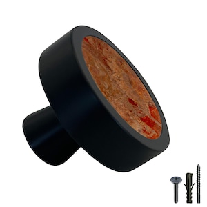 May include: Black round cabinet knob with a red and brown wood inlay. The knob has a black metal base and comes with screws for installation.