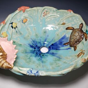 Custom Oval Vessel Sink With Large Conch Shell and Smaller Sea Life ...