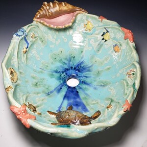 Custom Oval Vessel Sink With Large Conch Shell and Smaller Sea Life ...