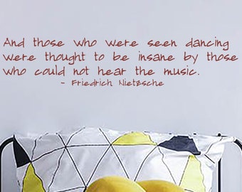 Vinilo decorativo con cita de Nietzsche: Baile, música y filosofía