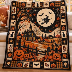 May include: A rectangular throw blanket featuring a Halloween scene with a large full moon, a flying witch, a haunted house, and a graveyard. The design includes orange pumpkins, black cats, bats, and autumn leaves, framed by a decorative border.