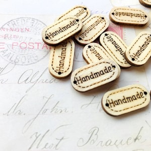 Wooden Tags &#39;Handmade&#39; - 24mm x 12mm - 2 Holes - Pack of 10