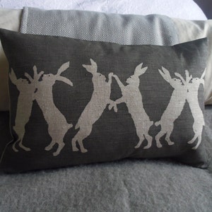 hand printed  reversible little  boxing hares cushion cover