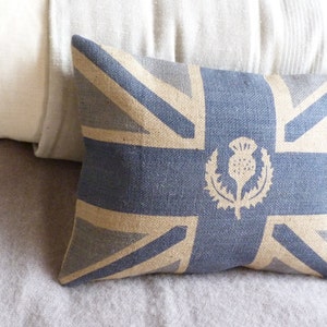 Handprinted muted royal blue union jack flag cushion cover with  logo thistle overlay