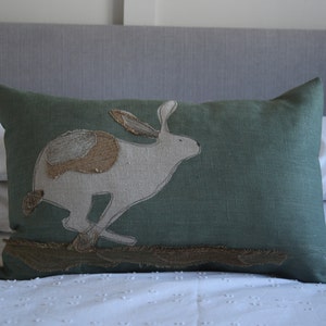 Handprinted hare cushion cover with applique detailing