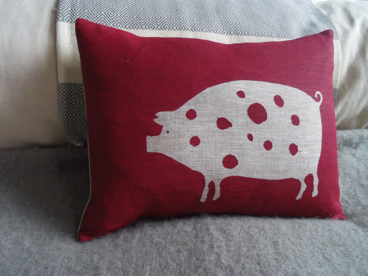 Handprinted Scandinavian red piggy cushion