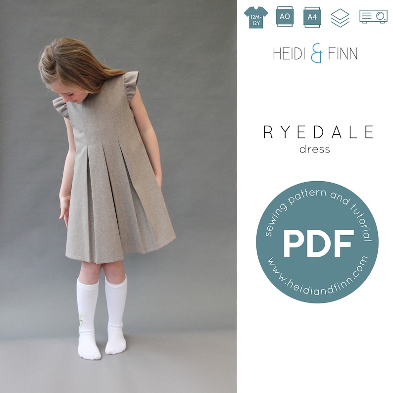 May include: A sewing pattern for a pleated dress called the Ryedale dress. The pattern is available as a PDF download from Heidi & Finn. The pattern is available in sizes 12 months to 12 years.