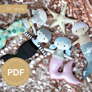 May include: A set of five 14-inch dolls, including a mermaid, an octopus, a sheep, a starfish, and a mermaid with a pink tail. The dolls are all lying on a bed of rose gold sequins. The text "sewing pattern and tutorial PDF www.heidianndfinn.com" is printed on a gold circle.