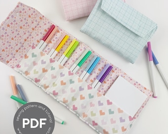 May include: A fabric pencil case with a star pattern and a heart pattern, holding colorful markers. Two matching fabric pouches are in the background. The pencil case has a white notepad and the text "PDF" in a circle.