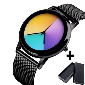 May include: A black wristwatch with a mesh band and a colorful dial. The watch face is divided into quadrants of yellow, purple, and blue. Includes a black gift box.