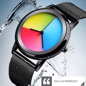 May include: Black wristwatch with a rainbow-colored face divided into four sections: yellow, red, blue, and green. The watch has a black mesh band and a black bezel. The watch is 30M waterproof.