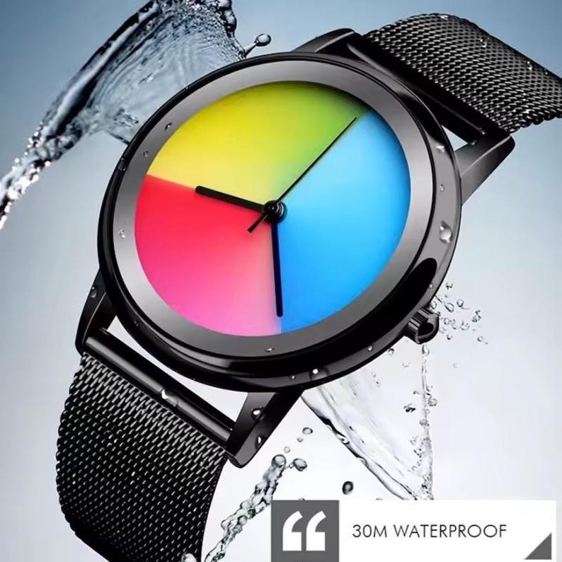 May include: Black wristwatch with a rainbow-colored face divided into four sections: yellow, red, blue, and green. The watch has a black mesh band and a black bezel. The watch is 30M waterproof.