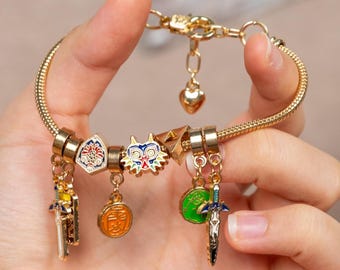 Legend of Zelda Christmas Charm Bracelet Enamel Gold Plated Jewelry with Triforce Master Sword Holiday Gift for Nintendo Fans LoZ TotK BotW