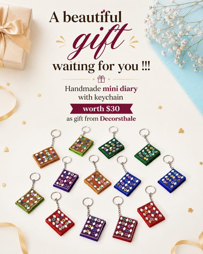 May include: A collection of thirteen handmade mini diary keychains in various colors including red, blue, green, purple, and brown. Each rectangular keychain features a decorative pattern of small mirrors and beads, attached to a silver metal ring.