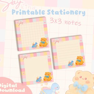 May include: Three 3x3 inch square notepads with a pastel pink, yellow, and blue border. Each notepad features a teddy bear and dinosaur illustration. The words "Stay Kind" are written on each notepad. The words "Printable Stationery" and "Digital Download" are also visible.