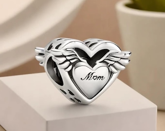 Colgante de corazón con alas de ángel de plata de ley - Grabado "Mamá, mi ángel"