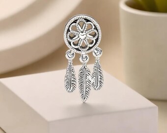 Amuleto atrapasueños de plata esterlina, de inspiración nativa americana.