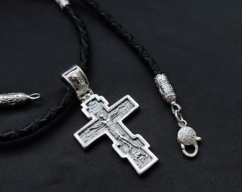 Silver cross and cord with sterling silver insert