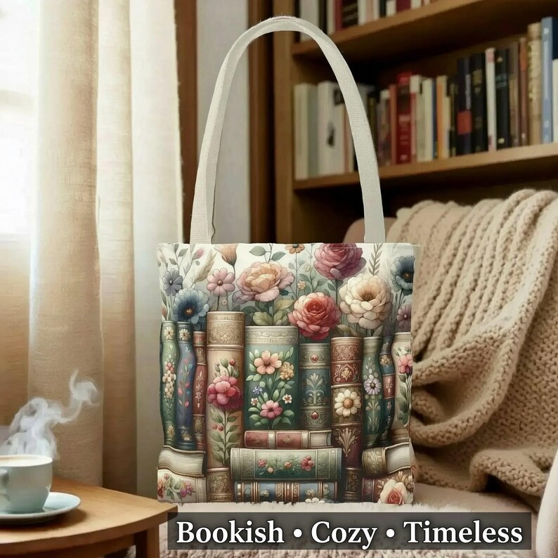A handbag with a floral design on it, placed on a wooden table in front of a bookshelf filled with books.