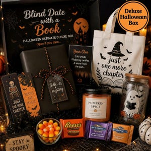 May include: A Halloween-themed gift box containing a wrapped book, a white tote bag with a witch hat graphic, a glass tumbler with a ghost design, a pumpkin spice candle, candy corn, and chocolate squares. Includes bookmarks and a clue card.
