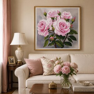 May include: A square framed wall art piece featuring a detailed painting of blooming light pink roses and green leaves against a soft gray background. The artwork is displayed in a thin gold frame, showcasing multiple open rose blossoms and buds.
