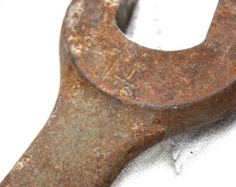 Vintage Solid Steel Wrench: Heavy Duty Farm Tool with Rustic Patina