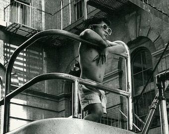 Black and White photograph of boy, urban photograph, Urban Landscape, wall art, home decor, boy playing